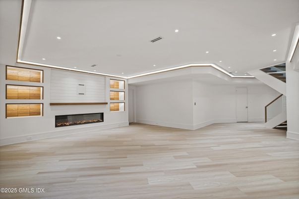 Empty room, Fireplace, Interior, Recessed Lighting, Wood Texture Flooring