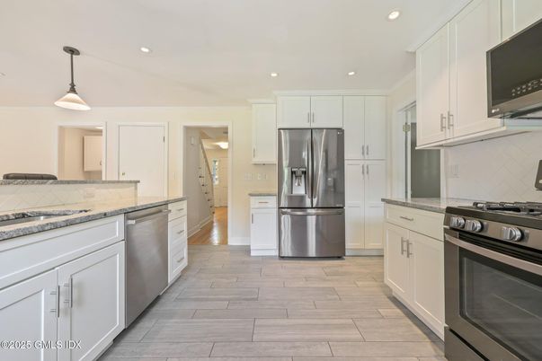 Interior, Kitchen, Pendant Lights, Recessed Lighting, Stainless Steel Appliances, Wood Texture Flooring