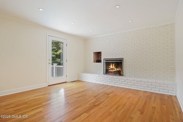 Empty room, Fireplace, Interior, Recessed Lighting, Wood Texture Flooring
