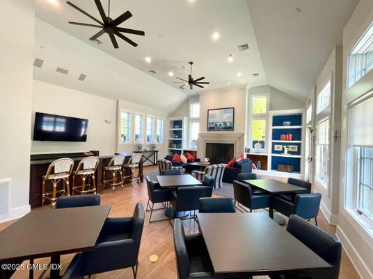 Dining room, Fireplace, Interior, Living room, Recessed Lighting, Wood Texture Flooring