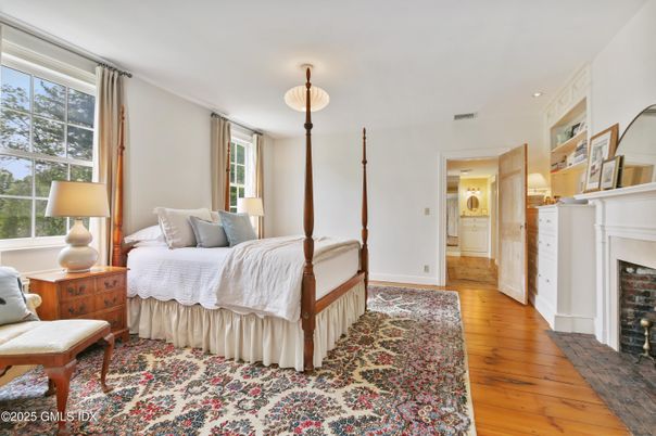 Bedroom, Fireplace, Interior, Recessed Lighting, Wood Texture Flooring