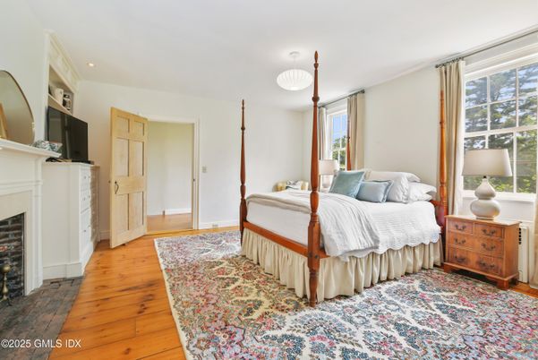 Bedroom, Fireplace, Interior, Recessed Lighting, Wood Texture Flooring