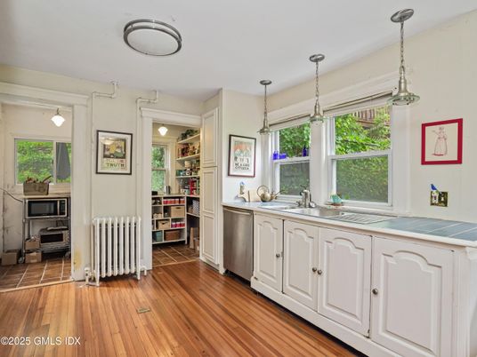 Interior, Kitchen, Pendant Lights, Tile Countertops, Wood Texture Flooring