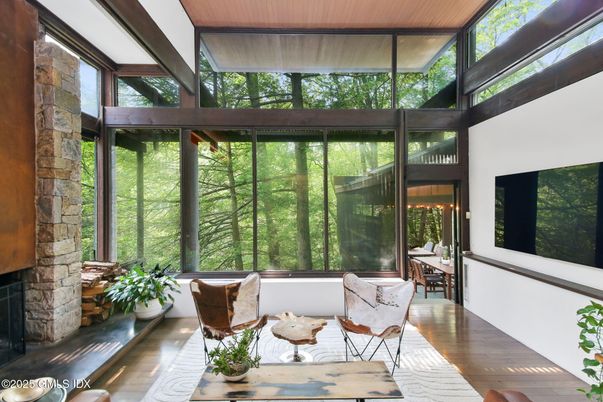Fireplace, Interior, Sun Room, Wood Texture Flooring
