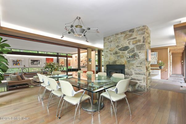 Dining room, Fireplace, Interior, Stone Walls, Wood Texture Flooring
