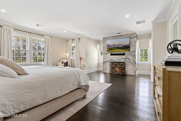 Bedroom, Fireplace, Interior, Recessed Lighting, Wood Texture Flooring