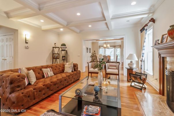 Chandelier, Dining room, Fireplace, Interior, Living room, Recessed Lighting, Wood Texture Flooring