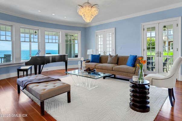 Chandelier, Interior, Living room, Piano, Recessed Lighting, Water, Wood Texture Flooring
