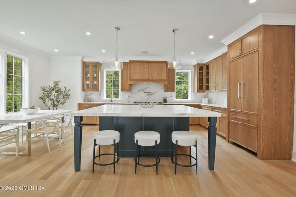 Dining room, Interior, Kitchen, Marble Walls, Pendant Lights, Recessed Lighting, Wood Texture Flooring