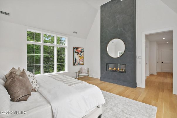 Bedroom, Fireplace, Interior, Recessed Lighting, Wood Texture Flooring