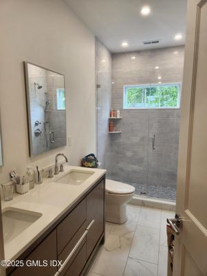 Bathroom, Dual Sink Vanities, Glass Shower, Interior, Marble, Recessed Lighting