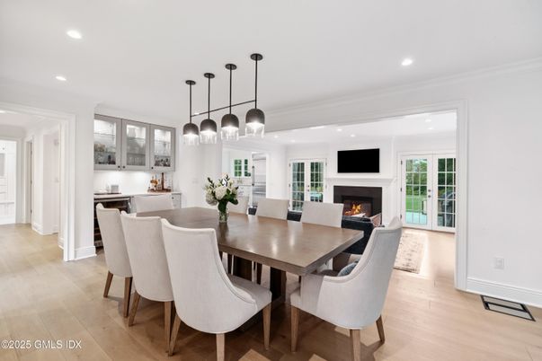 Dining room, Fireplace, Interior, Pendant Lights, Recessed Lighting, Wood Texture Flooring