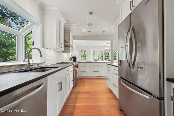 Chandelier, Interior, Kitchen, Recessed Lighting, Stainless Steel Appliances, Wood Texture Flooring