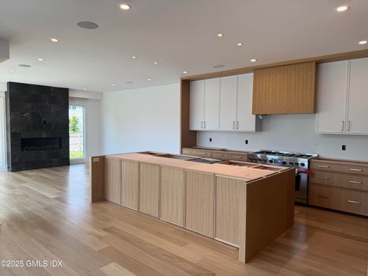 Fireplace, Interior, Kitchen, Recessed Lighting, Wood Texture Flooring