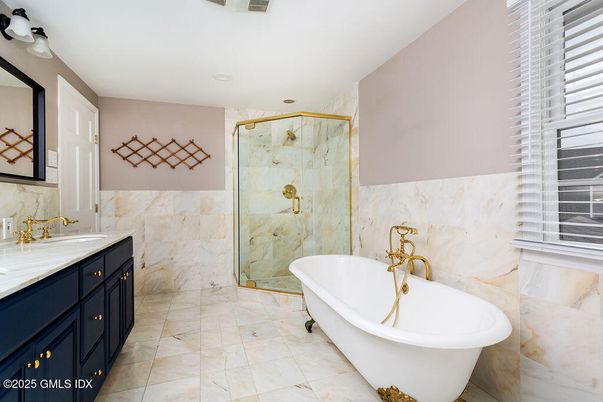 Bathroom, Free Standing Baths, Glass Shower, Interior, Marble Walls, Recessed Lighting