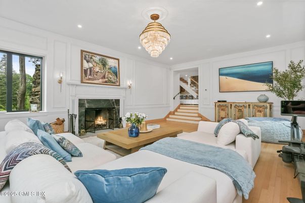 Chandelier, Fireplace, Interior, Living room, Recessed Lighting, Wood Texture Flooring