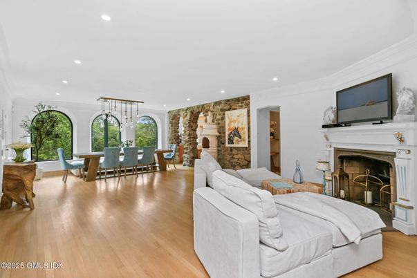 Dining room, Fireplace, Interior, Pendant Lights, Recessed Lighting, Stone Walls, Wood Texture Flooring