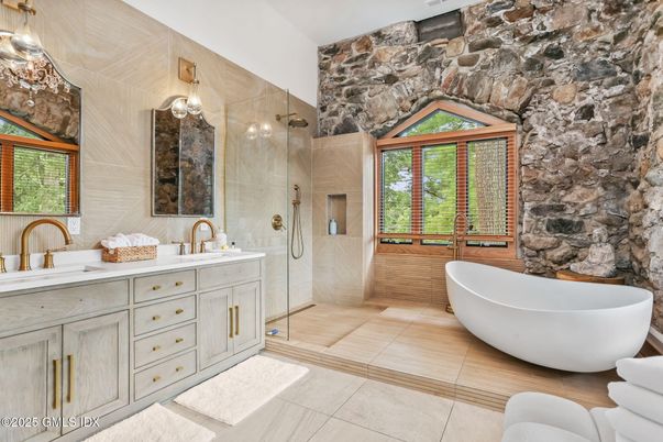 Bathroom, Dual Sink Vanities, Free Standing Baths, Glass Shower, Interior, Stone Walls