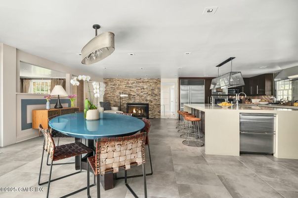 Dining room, Fireplace, Interior, Kitchen, Pendant Lights, Recessed Lighting, Stainless Steel Appliances, Stone Walls