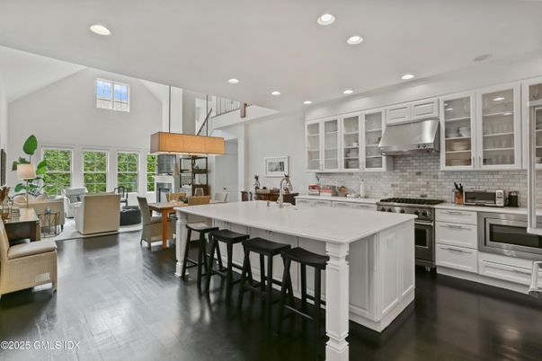 Dining room, Interior, Kitchen, Pendant Lights, Recessed Lighting, Stainless Steel Appliances, Wood Texture Flooring