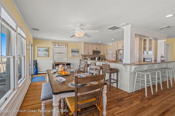 Dining room, Interior, Kitchen, Recessed Lighting, Stainless Steel Appliances, Wood Texture Flooring