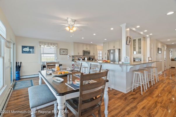 Dining room, Interior, Kitchen, Recessed Lighting, Stainless Steel Appliances, Wood Texture Flooring