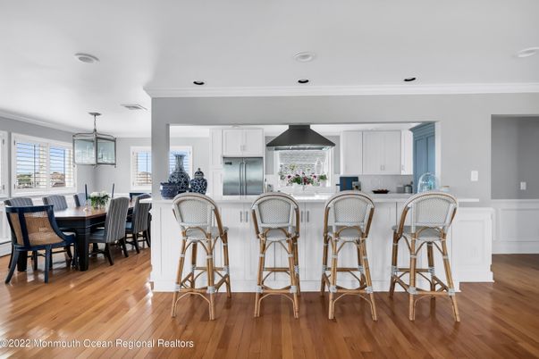 Dining room, Interior, Kitchen, Pendant Lights, Recessed Lighting, Stainless Steel Appliances, Wood Texture Flooring