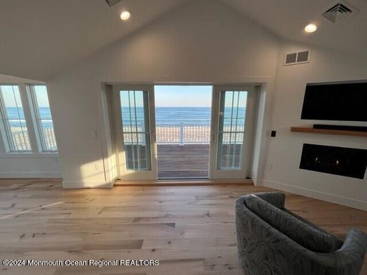 Empty room, Fireplace, Interior, Recessed Lighting, Water, Wood Texture Flooring