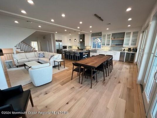Dining room, Interior, Kitchen, Living room, Pendant Lights, Recessed Lighting, Stainless Steel Appliances, Wood Texture Flooring