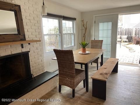 Dining room, Fireplace, Interior, Pendant Lights, Wood Texture Flooring