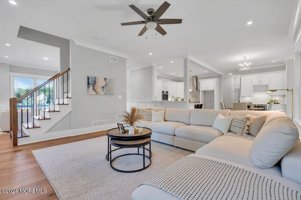 Chandelier, Dining room, Interior, Kitchen, Living room, Recessed Lighting, Stainless Steel Appliances, Wood Texture Flooring