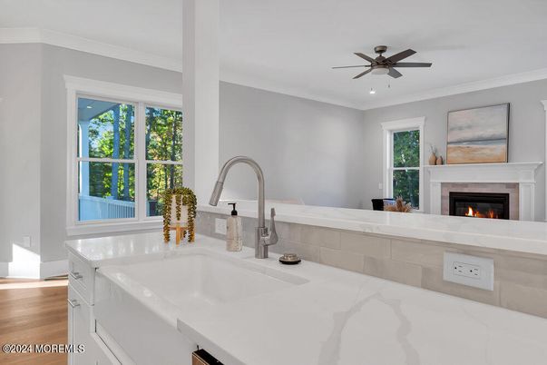 Fireplace, Interior, Kitchen, Recessed Lighting, Wood Texture Flooring