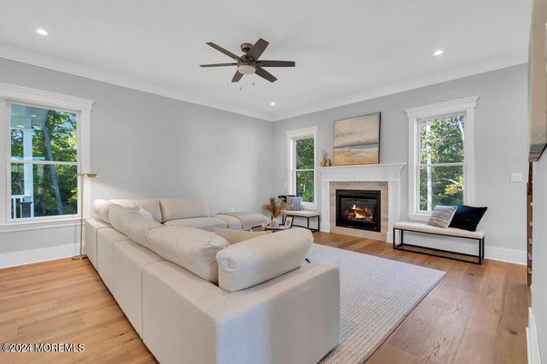 Fireplace, Interior, Living room, Recessed Lighting, Wood Texture Flooring