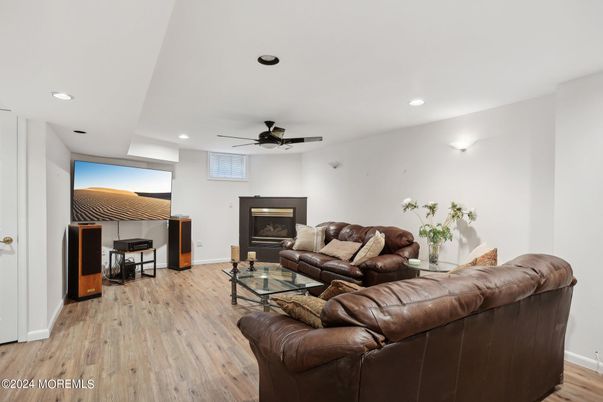 Fireplace, Interior, Living room, Recessed Lighting, Wood Texture Flooring