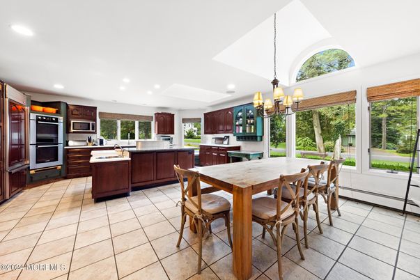 Chandelier, Dining room, Interior, Kitchen, Recessed Lighting, Stainless Steel Appliances