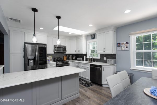 Interior, Kitchen, Pendant Lights, Recessed Lighting, Stainless Steel Appliances, Wood Texture Flooring