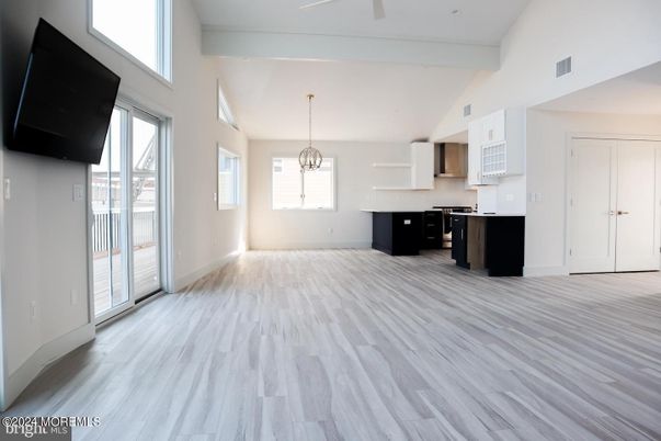 Chandelier, Empty room, Interior, Kitchen, Pendant Lights, Recessed Lighting, Wood Texture Flooring