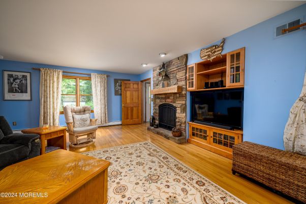 Fireplace, Interior, Recessed Lighting, Stone Walls, Wood Texture Flooring