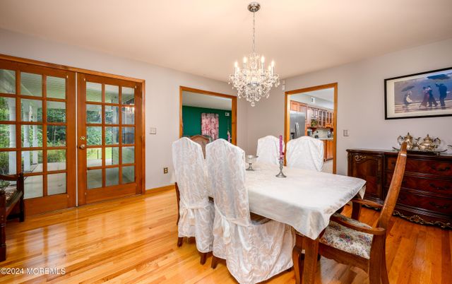 Chandelier, Dining room, Interior, Wood Texture Flooring