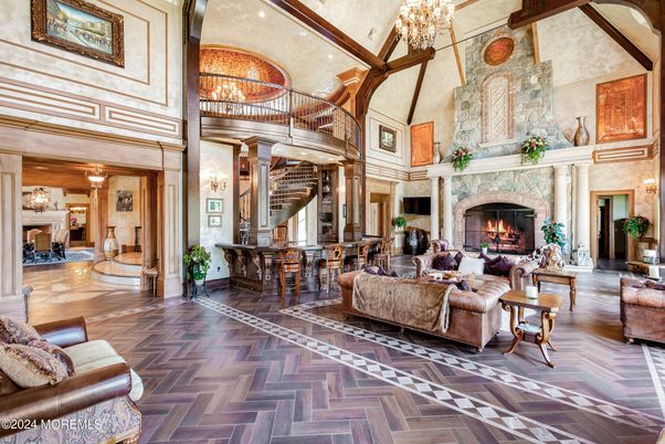 Chandelier, Fireplace, Interior, Living room, Recessed Lighting, Wood Texture Flooring