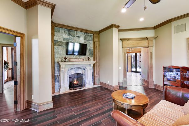 Fireplace, Interior, Recessed Lighting, Stone Walls, Wood Texture Flooring