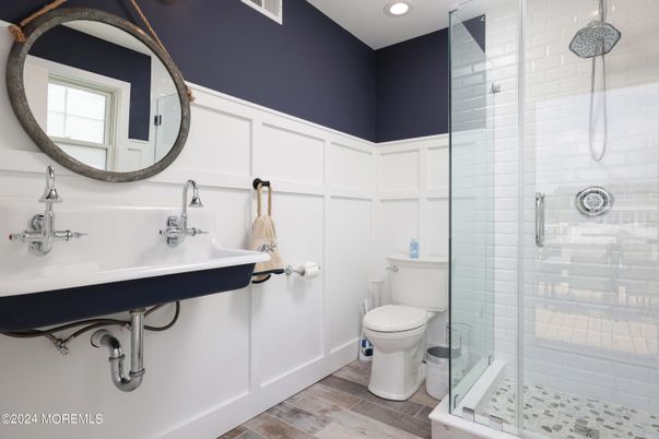 Bathroom, Glass Shower, Interior, Pendant Lights, Recessed Lighting, Wood Texture Flooring