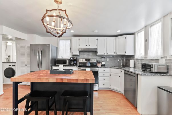 Chandelier, Interior, Kitchen, Recessed Lighting, Stainless Steel Appliances, Wood Texture Flooring