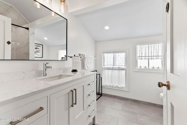 Bathroom, Dual Sink Vanities, Interior, Marble Walls, Recessed Lighting