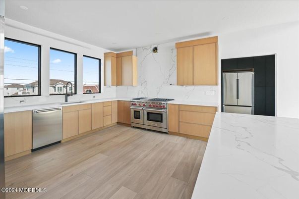 Interior, Kitchen, Marble Walls, Stainless Steel Appliances, Wood Texture Flooring