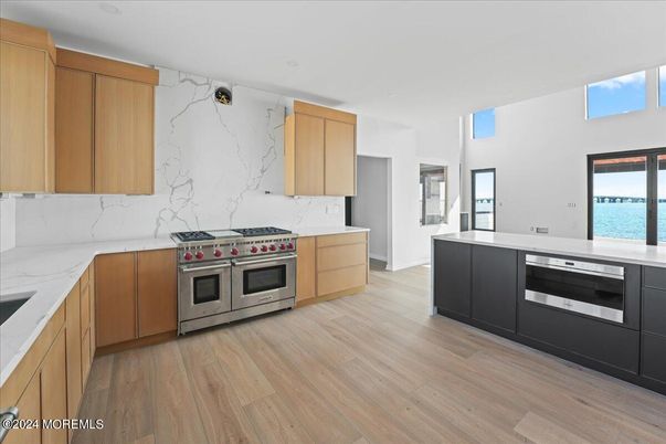 Interior, Kitchen, Marble Walls, Stainless Steel Appliances, Water, Wood Texture Flooring