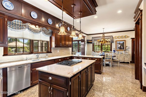 Chandelier, Dining room, Interior, Kitchen, Living room, Pendant Lights, Recessed Lighting, Stainless Steel Appliances