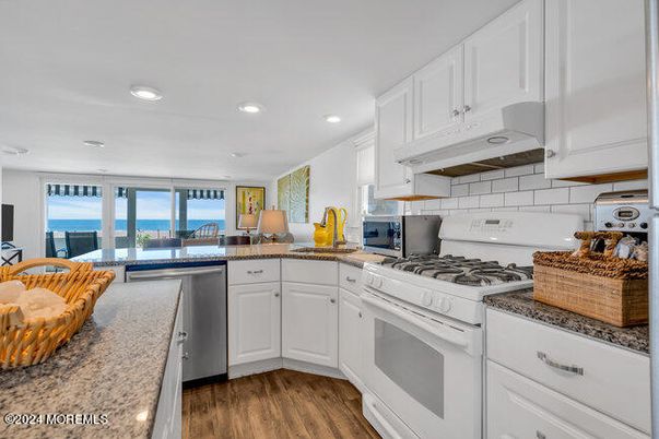 Interior, Kitchen, Recessed Lighting, Stainless Steel Appliances, Water, Wood Texture Flooring