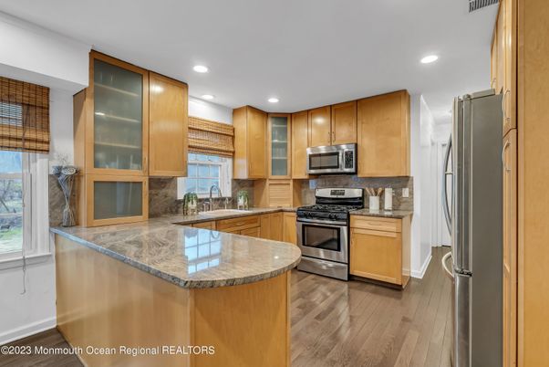 Interior, Kitchen, Recessed Lighting, Stainless Steel Appliances, Wood Texture Flooring