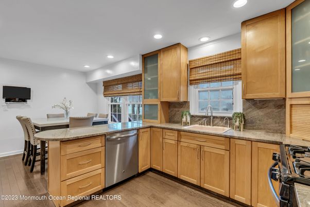 Dining room, Interior, Kitchen, Recessed Lighting, Stainless Steel Appliances, Wood Texture Flooring